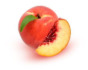 Peach and slice with a green leaf isolated on white background