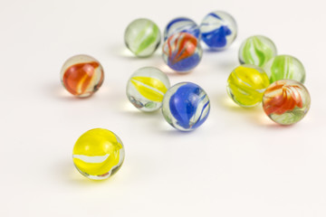 group of glass marbles in various colors