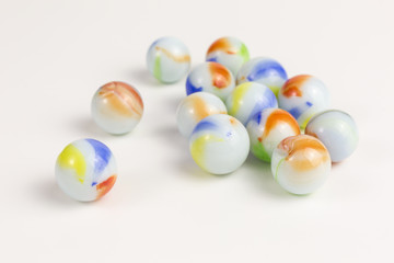 group of glass marbles in various colors