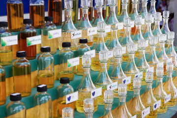 Aromatic oils on the shelf in the storeAromatic oils on the shelf in the store