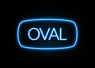 Oval  - colorful Neon Sign on brickwall