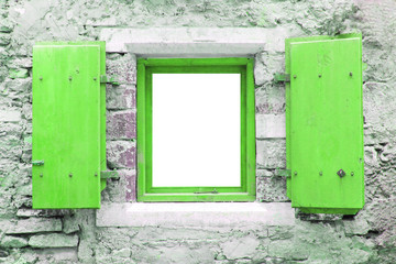 Open Window Bright Green Colored Old Shutters on Stonewall Background. Retro Timber Frame and Empty White CopySpace in the Center. Vintage style effect house facade exterior hung sash window.