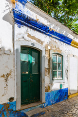 Fototapeta na wymiar In the old alleyways of Faro on the coast of southern Portugal