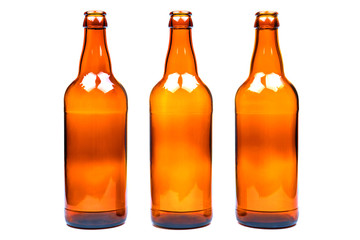 Brown glass bottle, isolated on a white background.