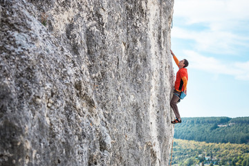 A rock climber on a rock.