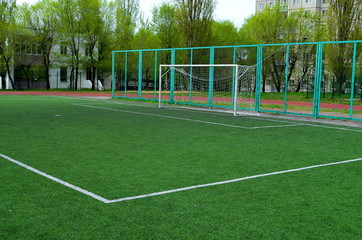 football field with artificial turf, angle, background