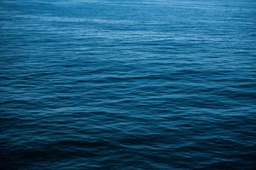 Abwaschbare Fototapete Ruhiger Meerwasserhintergrund © Tomasz Zajda