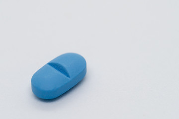 blue pill medicine pill on white background