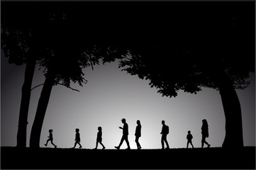 Silhouette family on a walk.