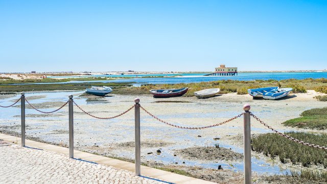 Fuseta Beach View And Boats In Portugal
