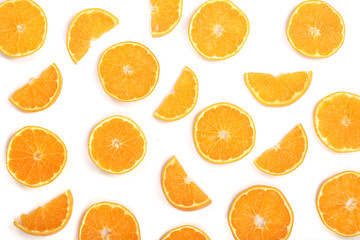 Slices of orange or tangerine isolated on white background. Flat lay, top view. Fruit composition