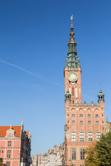 Fototapeta premium View of the Main Town Hall located at Long Market Street (Long Lane) at the Main Town (Old Town) in Gdansk, Poland, on a sunny day.