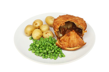 Steak pie and vegetables