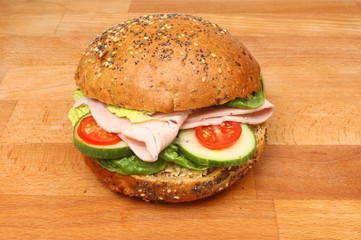 Ham roll on a chopping board