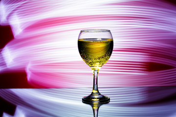  glass of champagne on  red background. 