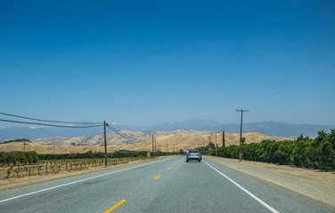 Picturesque road in the Sierra Nevada. Agricultural Area in California
