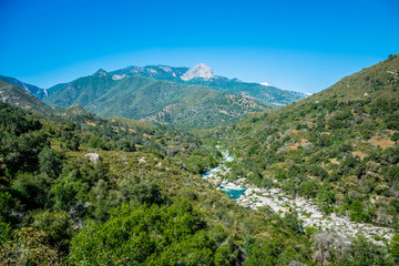 Picturesque mountain river valley and rocks in the Kings Canyon Preserve, California.