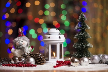 new year candle lantern with bokeh lights in background