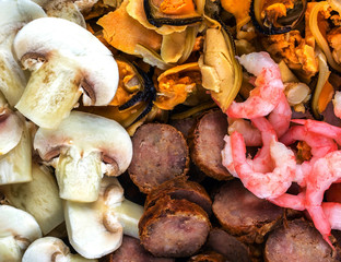 shrimp, mussels, mushrooms, salami . background ingredients for pizza.