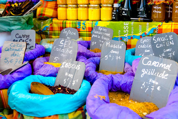 Oriental and caribbean spices on sale on a market stall in Guadeloupe
