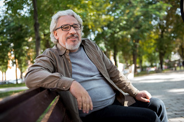 Obraz premium Happy mature man relaxing in the nature
