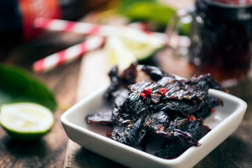 Beef Jerky on wooden background