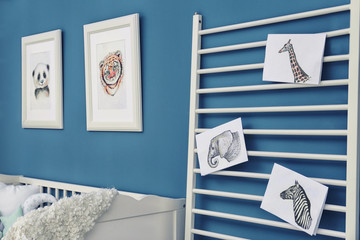 Baby room decorated with pictures of animals