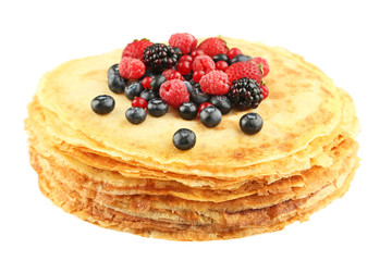 Pancakes with berries isolated on white background