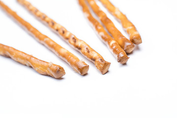 Macro Of Some Pretzel Saltsticks On White Background