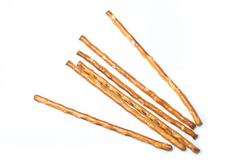 Some Pretzel Saltsticks On White Background