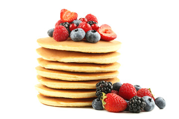 Tasty pancakes with berries isolated on white