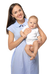 Happy young woman with cute baby on white background