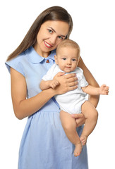 Happy young woman with cute baby on white background