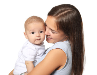 Happy young woman with cute baby on white background