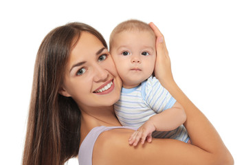 Happy young woman with cute baby on white background
