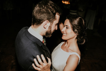 .Young and beautiful couple in love dancing their first waltz as husband and wife. Lifestyle portrait.