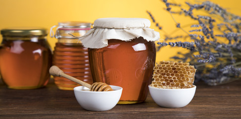Fresh honey on wooden table