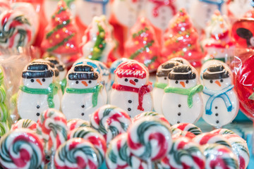Snowman shaped candies on open market stall