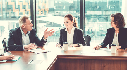 Business partners discussing documents