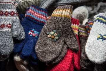 Handmade woolen knitted hand gloves with ornaments 