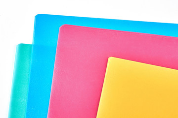 Colored paper folders close up. Set of blank multicolored envelopes for documents, cropped image. Paper work and stationery concept.