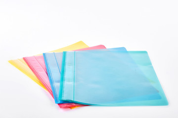 Set of colorful transparent folders. Multicolored file folders of premium quality, white background.