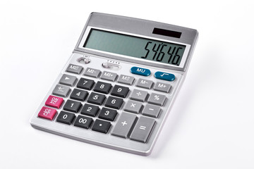 Silver calculator isolated on white background. Gray calculator over white background.