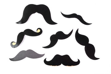 Set of fake moustaches on white background. Fake black mustache isolated on white background. Gentelman party concept.
