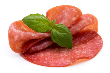 Salami slices isolated on white background.