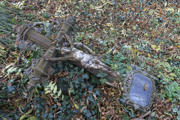 Historic Jesus on the mystery old Prague Cemetery, Czech Republic