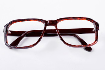 Vintage style glasses on white background. Brown retro rim eyeglasses isolated on white background.