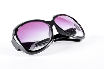 Female sunglasses with purple glass. Woman oversized sunglasses with black plastic frame.