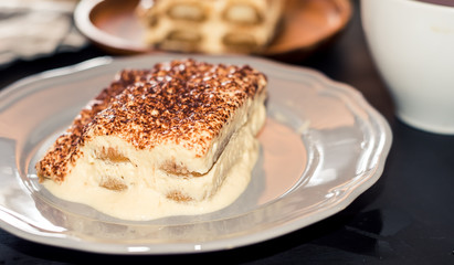 Homemade tiramisu cake Traditional Italian cuisine, Selective focus