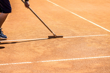 Preparation of tennis courts